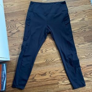 size XL black stretch athletic leggings with pockets